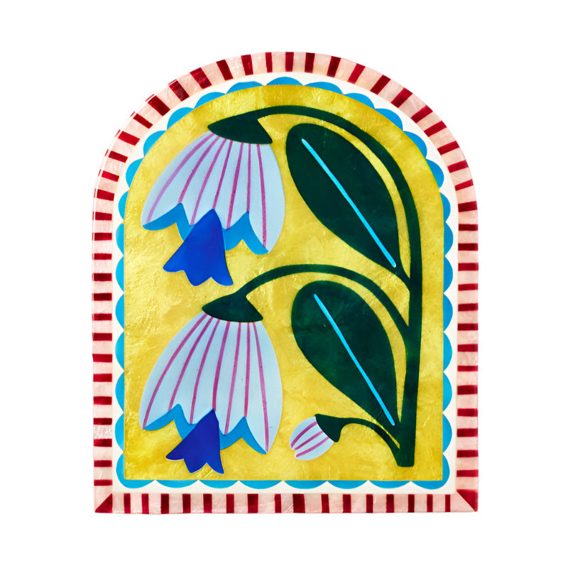 Decorative wall tile with colourful floral design and red striped border